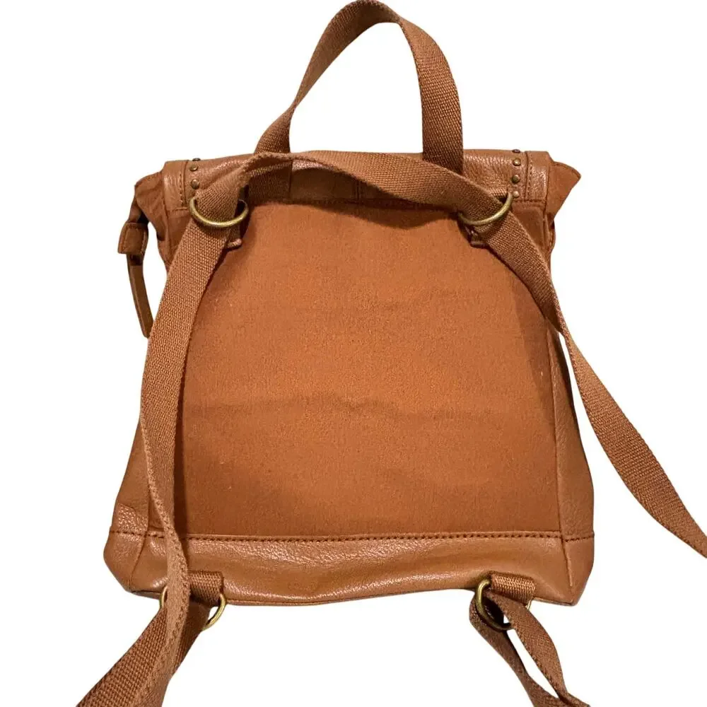The Sak caramel brown leather messenger bag studded backpack Boho casual purse